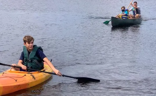 Kayaking Canoeing To Pull Trash
