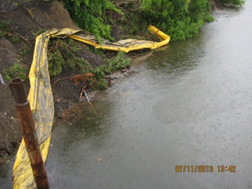 laborers to deploy the turbidity curtain
