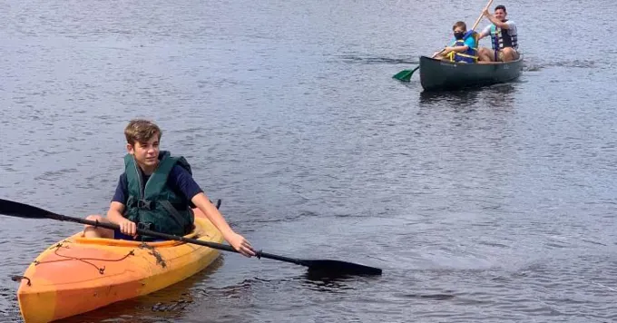 Kayaking Canoeing To Pull Trash