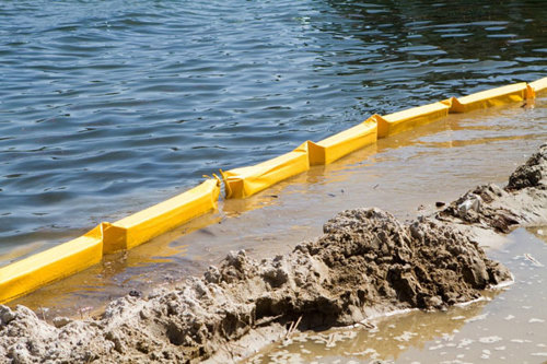 floating barrier that traps solids