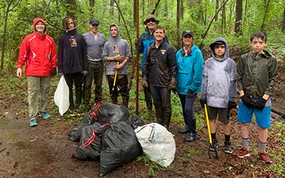 Jim Lang and Team Cleaning the River