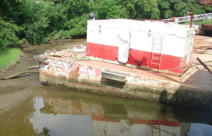 Derelict Vessel Dumped On Shore Of Elizabeth River In Norfolk 1