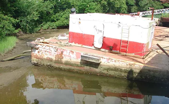 Derelict Vessel Dumped On Shore Of Elizabeth River In Norfolk 1