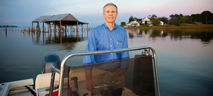 Jim Lang Driving A Boat In Suffolk Virginia